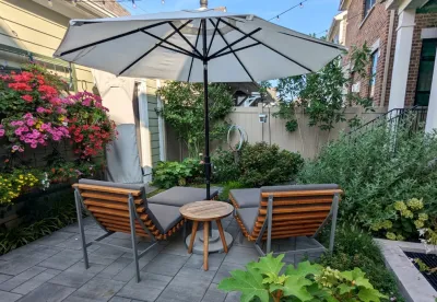 Small Lush Courtyard by Jacobs Grant Design Ltd