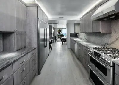 Laguna Beach Project: Modern Quarter Sawn Cherry Wood with Porch Swing Finish by The Kitchen Design Center