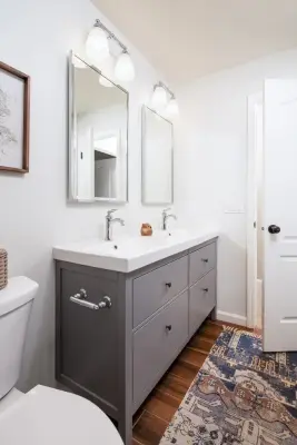 Bohemian Vintage Bathroom by HC Remodel & Design