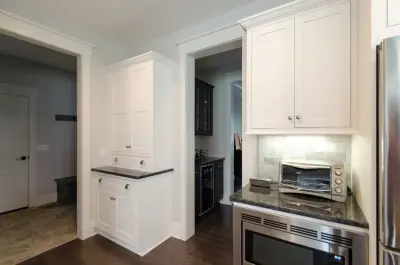 Pristine and Organized, White Transitional Kitchen and Bar Areas by Inde Kitchen Remodelers