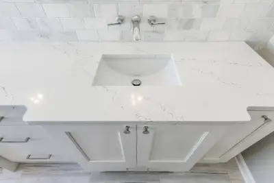 Minimalist White Bathroom Design by BeeTree Homes