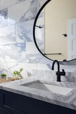 Navy Guest Bathroom Renovation by CMK by CMK Construction