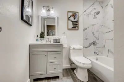 Modern and Stylish Two-Bathroom Renovation in Newport Beach by USA Home Remodeling