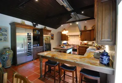 Rustic Kitchen at Coconut Grove by Eleet Fine American Cabinetry