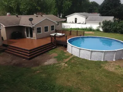 Deck with hot tub and swimming pool — Kitchen Remodeling project by JSR Construction Inc