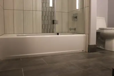 Condominium Bathroom Renovation by NextGen Design & Build Inc