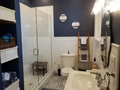 Modern 1908 Bathroom Renovation by Concord Construction