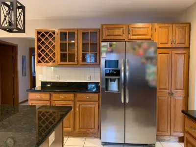 Modern Kitchen Featuring Off-White Shaker Cabinets by Kitchen Solvers Of Madison