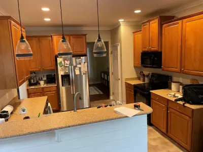 Modern Kitchen Renovation Featuring a Two-Tone Palette by Kitchen Solvers Of Charleston