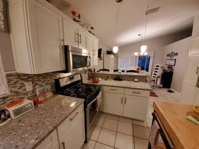 Modern Kitchen Renovation in Snow White by Kitchen Solvers Of Fort Lauderdale