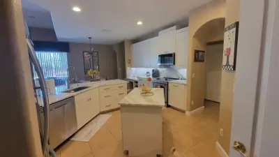Modern Kitchen Renovation Featuring Cabinet Refacing by Kitchen Solvers Of Orlando