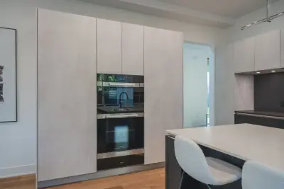 Modern Kitchen with Textured Concrete Finish in Bethesda MD by UCS Kitchen Design