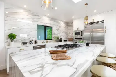 Modern Kitchen Featuring a Spacious Island Centerpiece by Rafael Inc