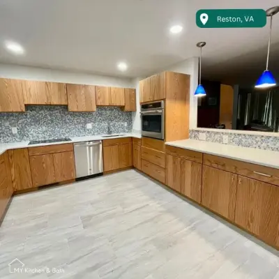 Modern Kitchen Featuring Oak Cabinets by My Kitchen And Bath