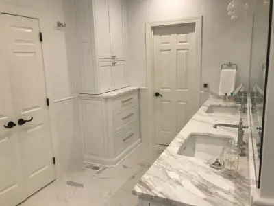 Modern White Master Bath Renovation by Concord Construction