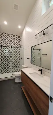 Bathtub to Walk-In Shower Transformation with Complete Features by Fox Remodeling & Construction LLC