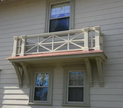 Custom Railing with Copper Roof — Kitchen Remodeling project by LaCroix Remodeling & Additions, Inc.