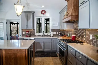 Warm Gray and Hickory Kitchen by Callier & Thompson Kitchens, Baths And Appliances