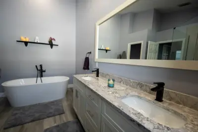 Accessible Bathroom with Compact Freestanding Tub by CMK Construction
