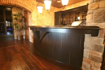 Bespoke Stone Bar by Walters Cabinets, Inc.
