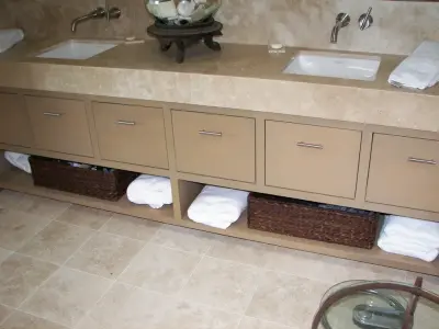Bespoke Cabinetry with Marble Countertops by Serene Remodeling, LLC