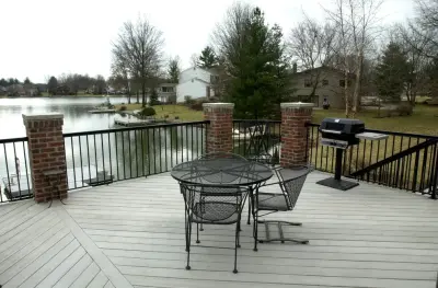 Personalized Deck Featuring Brick Pillars by JM Construction