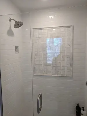 Personalized Media Wall and Restroom by Concord Construction