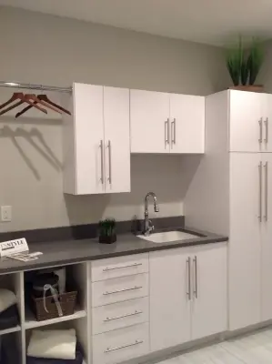 Tailored Laundry Room Cabinets — Kitchen Remodeling project by Shurfine Cabinets And Woodworking, LLC.