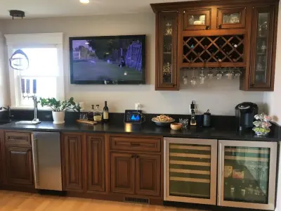 Personalized Bar Space by Taylor And Stevens Cabinetry