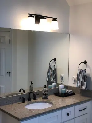 Personalized tiled shower by HM Remodeling