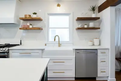 Minneapolis Kitchen Renovation Featuring Two-Tone Cabinets and a Green Island by Prima Construction