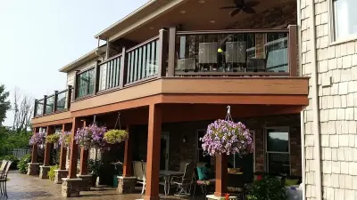 Transparent Balustrade, Illumination, Below Decking, Composite Patio by Medina Exteriors & Remodeling
