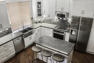 Elegant White Shaker Kitchen in Thousand Oaks by Metropolis Drafting And Construction Inc