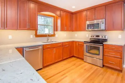 Smith Kitchen with duct and plumbing challenges by Annapolis Heirlooms