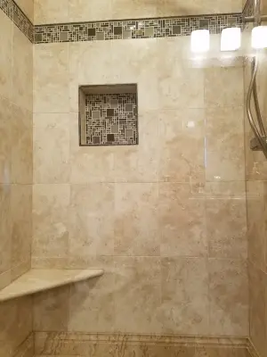 Natural Hue Shower Enclosure with Woven Basket Floor by Paramount Tile Design