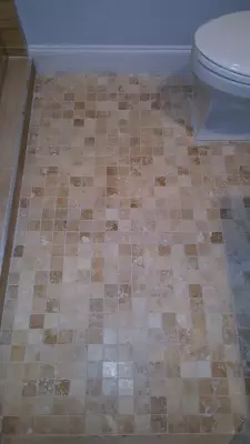 Travertine on the East Side — Kitchen Remodeling project by Zendo Renovations