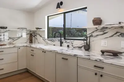 Sophisticated Bel Air Kitchen Renovation with French Influence by Concept Renovations, Inc.