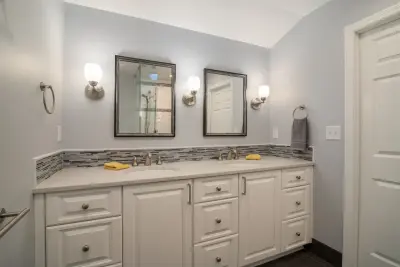 Sophisticated Bathroom Renovation in Brookfield by Advantage Design + Remodel
