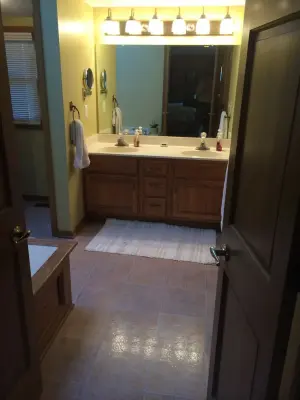Dual Vanity Master Bathroom with Custom Shower for Two by Bathroom And Kitchen Services, LLC