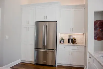 Estes Remodeling of Kitchen, Pool Bath, and Laundry Room by The Bath And Kitchen Gallery, Inc.