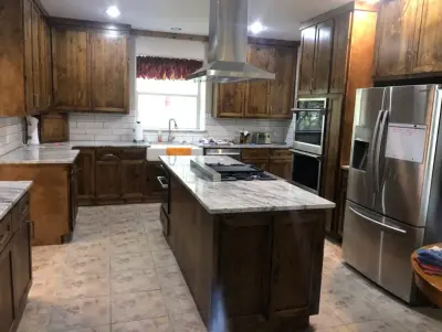 Magnolia Farmhouse Kitchen by Premium Residential Remodeling