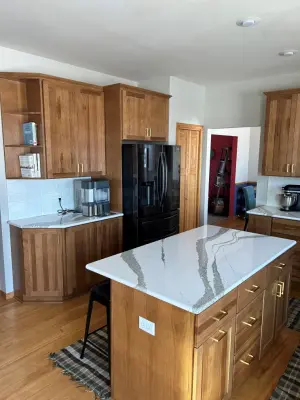 Hickory-Finished Kitchen Renovation in Farmhouse Style by Kitchen Solvers Of Eau Claire
