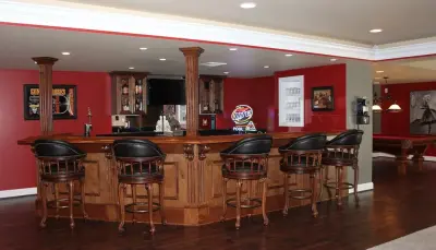 Perry Hall Basement Renovation Featuring a Fully Custom Bar Area by Taylor Made Custom Contracting Inc.