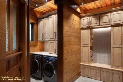 Stylish Laundry — Custom Home Builders project by Golden Eagle Log & Timber Homes