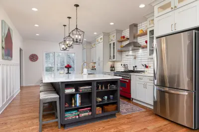 Contemporary Renovation of Kitchen, Entryway, and Laundry Room by HomeStar Renovations