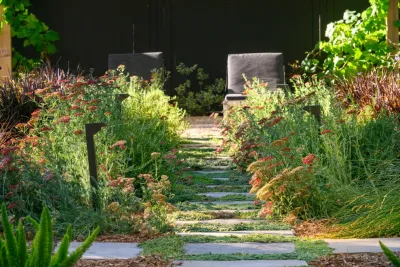 Elegant outdoor living space in a stunning Natural setting by Kristen Rudger Landscape Design