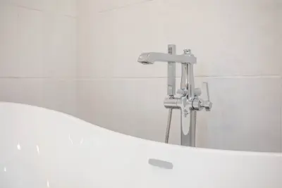 Expertly Designed Master Bath by Baine Contracting, Inc.