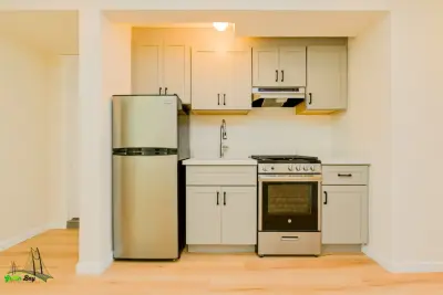 Contemporary Elegant Kitchen Renovation in Regent San Francisco by Green Bay Remodeling Inc.