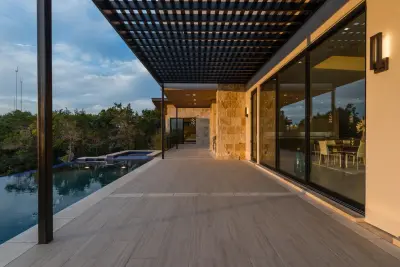 Contemporary Tailored Residence Austin by Camelot Custom Homes Inc.