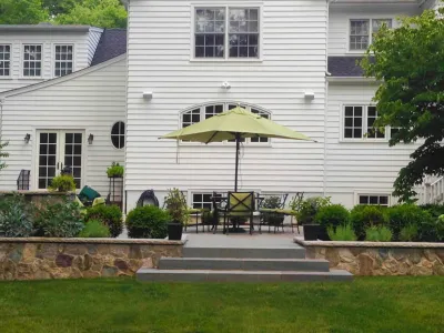 Summits Classical Bluestone Patio & Fire Pit — Landscape Design project by Land Identity in Summit
